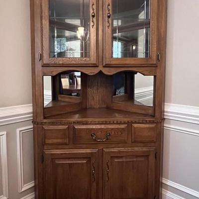 Corner Cabinet with Shelves And Storage by Graebel Furniture