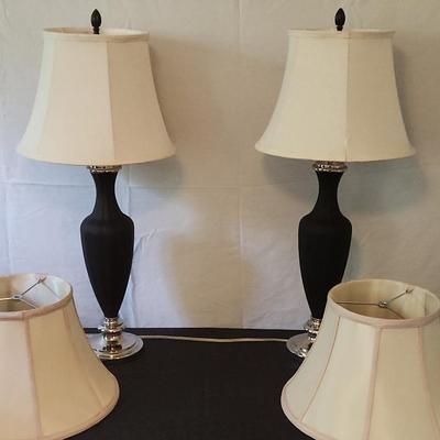 Two Black Lamps With Extra Lamp Shades