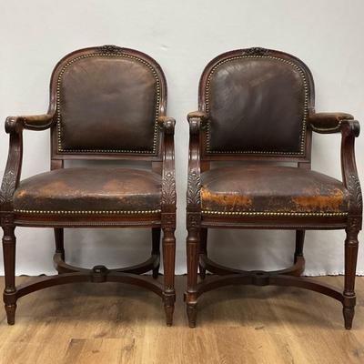 Pair Of Wood And Leather Carver Chairs