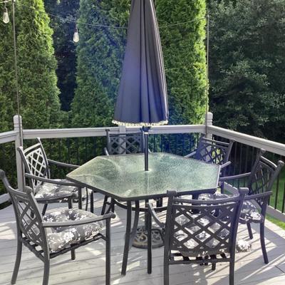 Sale Photo Thumbnail #10: Wrought iron patio table and chairs with umbrella
