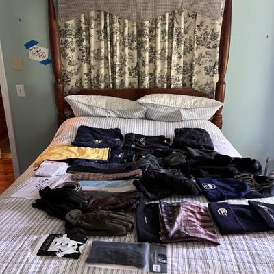 Men’s accessories atop Tiger maple poster bed
