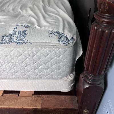 Antique hand carved four poster bed