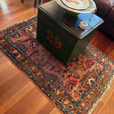 Likely antique hand knotted carpet. 
