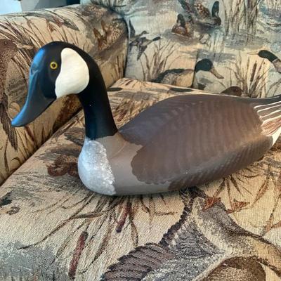 Unsigned solid wood handmade duck decoy. 