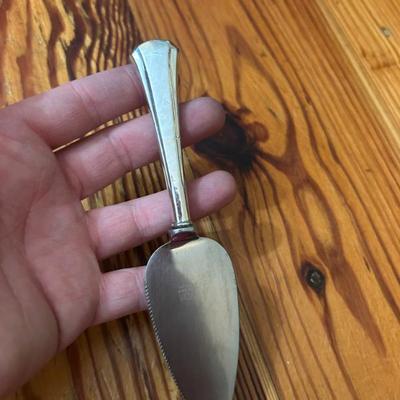 Small sterling silver handle and stainless blade server by Gorham. Engraved W. 