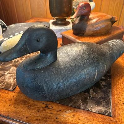 Solid wood duck decoy. Can’t make out makers mark. 