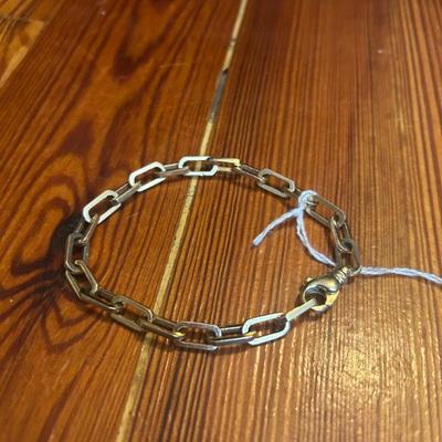 14k yellow gold solid paperclip bracelet.  Weighs over 20 grams. Measures 8.5 inches long. Made in Italy. $1100