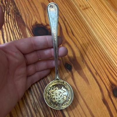 English sterling silver sugar sifter. 
