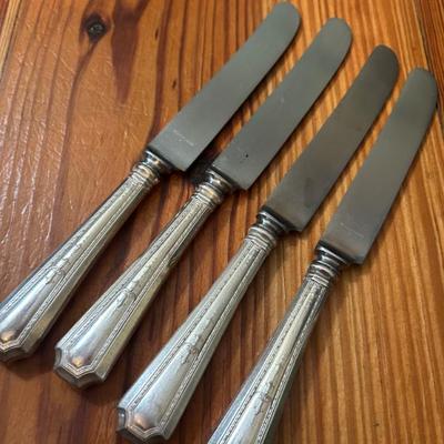 Set of four Gorham Sterling silver butter knives. Monogrammed JDW. Stainless blades. 