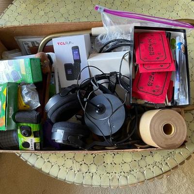 AAA180 - Mystery Lot-Headphones, Cell Phone, Vitamin Holders, Etc 