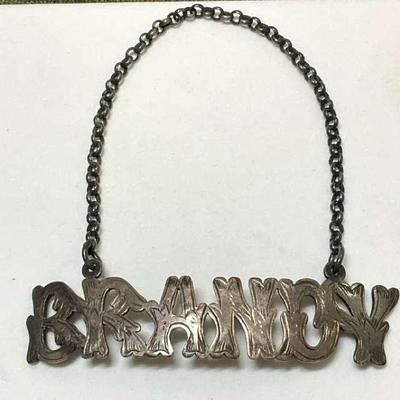 Williams co antique brandy decanter label