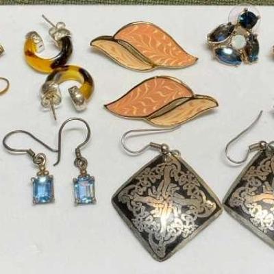 Eight pairs of earrings