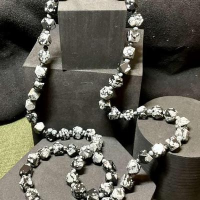 Snowflake obsidian strand of beads