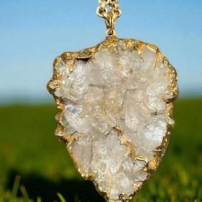 Quartz pendant dipped in gold