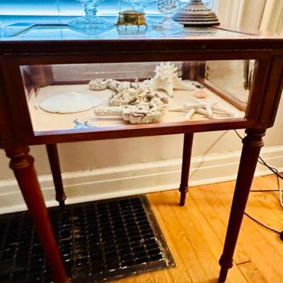 Sale Photo Thumbnail #89: Display cabinet w/ shell decor