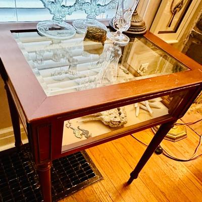Sale Photo Thumbnail #91: Display cabinet w/ shell decor