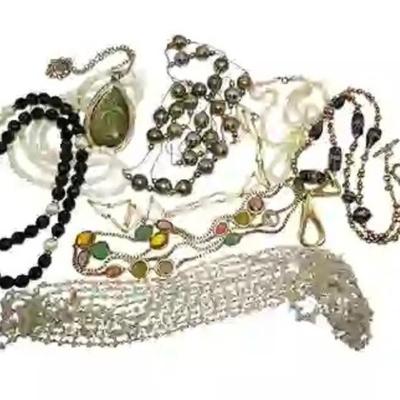 Sale Photo Thumbnail #79: 13 Vintage Assorted Costume Necklaces. Total lot weight is 1 lb 5 oz.