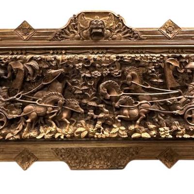 Sale Photo Thumbnail #153: Large Antique 19th c Balinese teak panel, skilfully hand carved in raised relief with various Hindu deity and figures in chariots (possibly the Mahabharata) with decorative borders Measures 61" long x 4 1/2" deep x 31" tall.