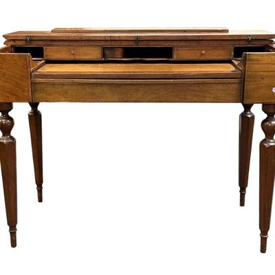 Sale Photo Thumbnail #172: Antique / Vintage American Solid Mahogany Spinet Desk, Grand Rapids, Michigan. Mark for Colonial Manufacturing Co. (1906-1983). The top fold open to interior with sliding writing surface, four drawers and 3 pigeonholes, long drawer below on turned and sha