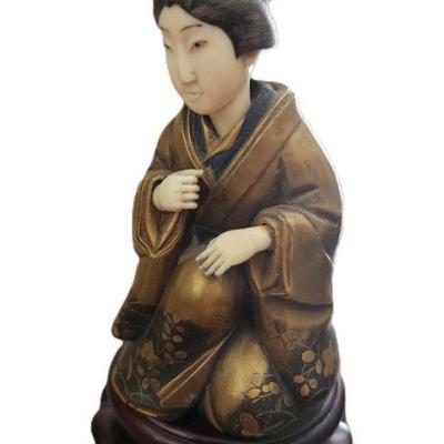 Sale Photo Thumbnail #47: Japanese Meiji period gold-decorated and lacquered wood Geisha with bone insert face, hands and feet. On carved Rosewood base. Om base measures3"x3"x5 1/2".