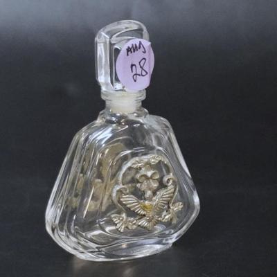 Sale Photo Thumbnail #103: French Cristal 1920s Perfume Bottle, with silver bird and floral applied decorations both sides. 3 1/2". Weight 6 oz. Provenance: Gippy Plantation, Avenue of Oaks, Berkeley County, SC.