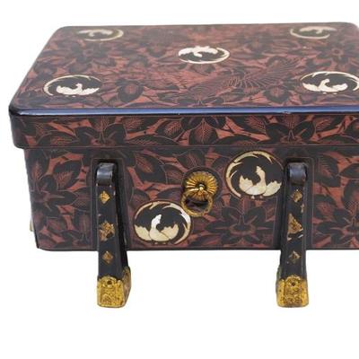 Sale Photo Thumbnail #183: Antique Japanese lacquered casket, in miniature shape of an ancient sutras holder, japanned with the art esoteric to Nara, vermillion layer finished with brown coating and engraved design showing the color beneath. Measures 9 1/2"x7.25"x 4.75". Weight 1 l