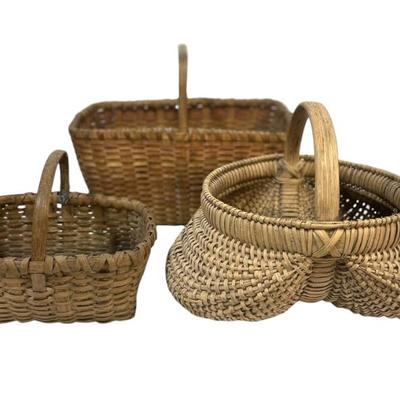 Sale Photo Thumbnail #96: 3 Antique American Splint Gathering Baskets. Buttocks Basket has missing splint to bottom. Buttocks 14"x10. Small 11.5"x7". Large 17"x11".