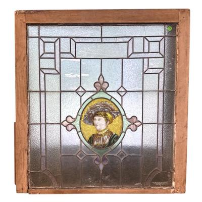Sale Photo Thumbnail #163: Antique Leaded Stained Glass Window with a Central Medallion Portrait of a Victorian Dressed Woman. Measures 31"x24"x 1 1/2". Weight approximately 23 lbs. Provenance: Gippy Plantation, Avenue of Oaks, Berkeley County, SC.