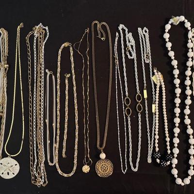 Lot 227: White And Gold Tone Costume Jewelry 