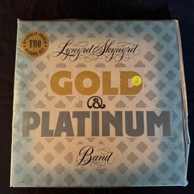 Lot 209: Lynyrd Skynard Gold And Platinum Album Set  Mint Condition 