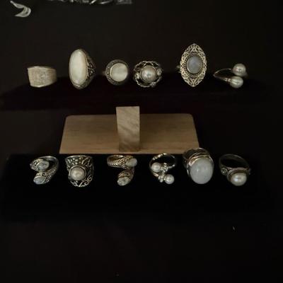 Lot 455: Lot of 12 Sterling Silver Rings – Sizes 7-8, 2.98 oz Total Weight