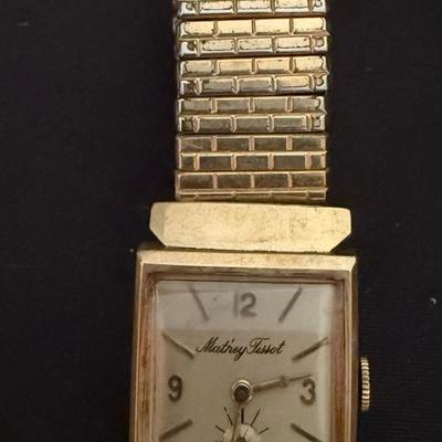 Lot 424: Vintage Lady Elgin 14K Gold Wristwatch with Speidel Band