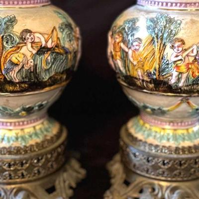 Lot 168:  Pair of Antique Majolica Figural Jardinières on Ornate Metal Bases