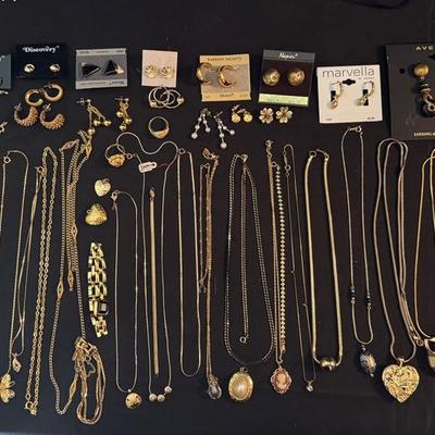 Lot 228: Gold Tone  Necklaces, Earrings, And Bracelet 