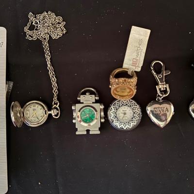 Lot 438: Lot of 7 Assorted Novelty & Fashion Watches – Clip, Pendant, Ring & Keychain Styles