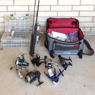 Large Fishing Lot- 2 poles, 7 reels, bag of supplies & 3 boxes of lures