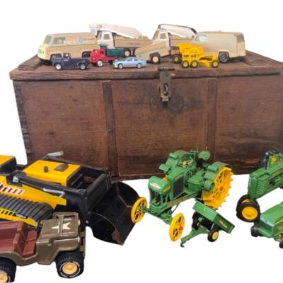 Vintage toy lot, including John Deere metal tractors, and Tonka trucks with wooden Crate storage