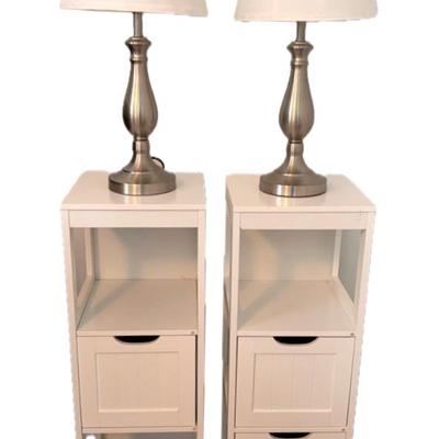 Two White End Cabinets And Two Silver-toned Lamps
