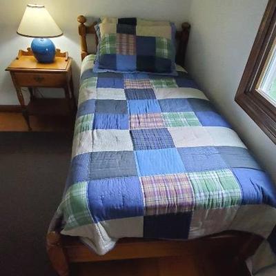 Twin Size Bed Frame, Table Lamp and Plaid Bedding