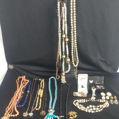 A Collection of Jewerly. Frosted Mickey Mouse, Earrings, Necklaces, Bracelet, Brooch. 