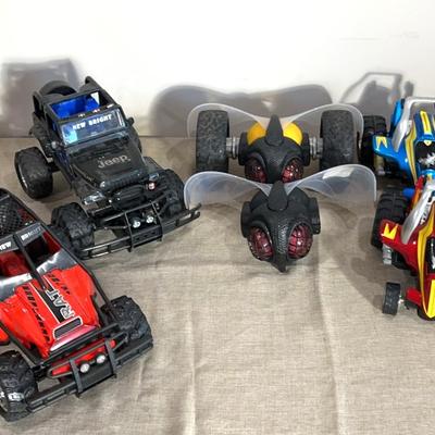 Radio Control Buggy, Jeep, And Tumblers
