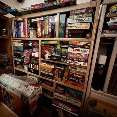 Over 40 book cases filled with over 200 board games and puzzles 