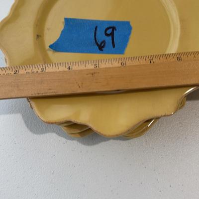 Four Mustard Colored Flower Shaped Plate
