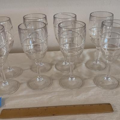 Set Up Eight Plastic Wine Glasses