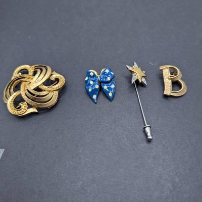 Monet GT Swirl Brooch, Blue Painted Bow Brooch, Monet Star Rhinestone Stickpin, Trifari B Brooch