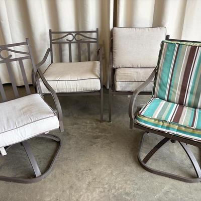 Four Cast Aluminum Brown Patio Chairs 