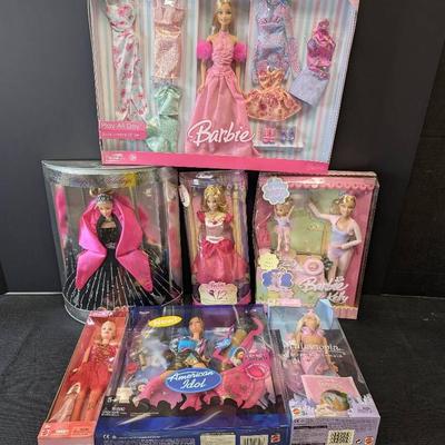 7 New In Pack Barbie Dolls