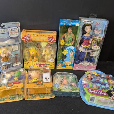 Group Of New In Pack Toys... Disney, Peanuts, Rainbow Brite