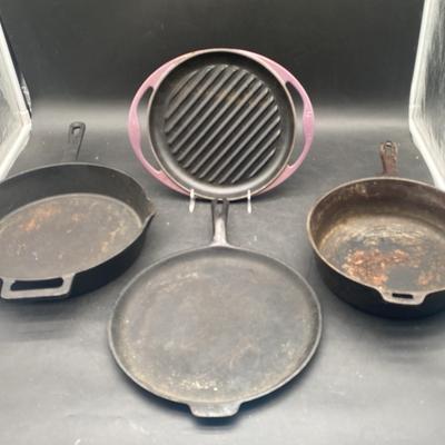 (3) Cast Iron Pans And (2) Le Creuset Grill Pan