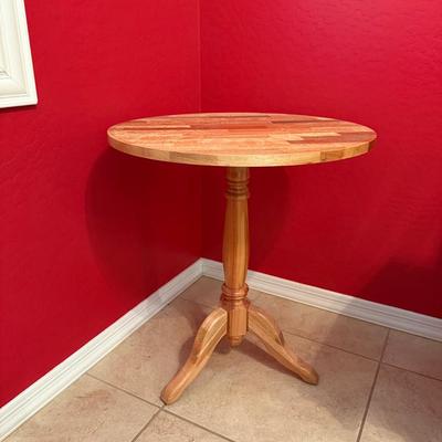 Round Wooden Pedestal Table